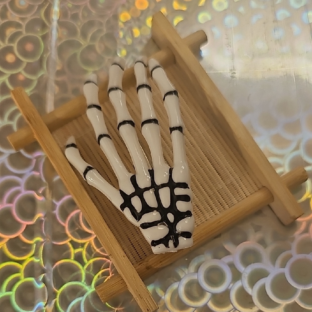 Skeleton Hand Hair Barrett